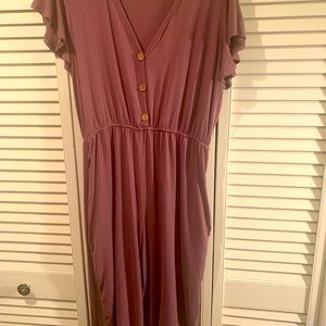 Romper color is mauve